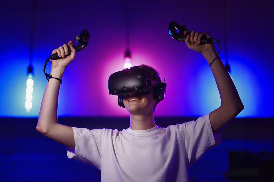 The player plays the game using virtual reality. Neon style. High quality photo